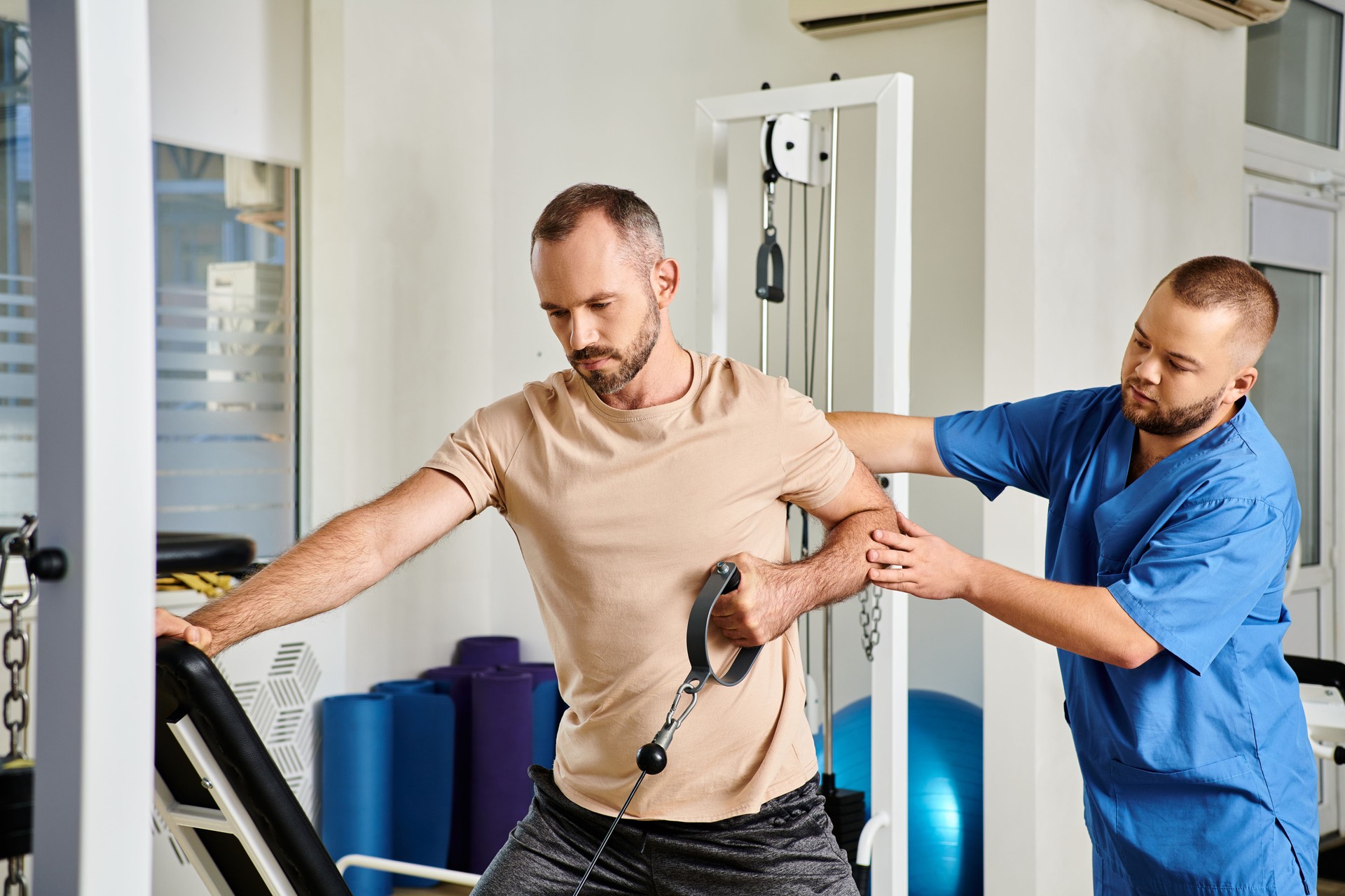 A dedicated rehabilitation session with a skilled doctor in a modern clinic