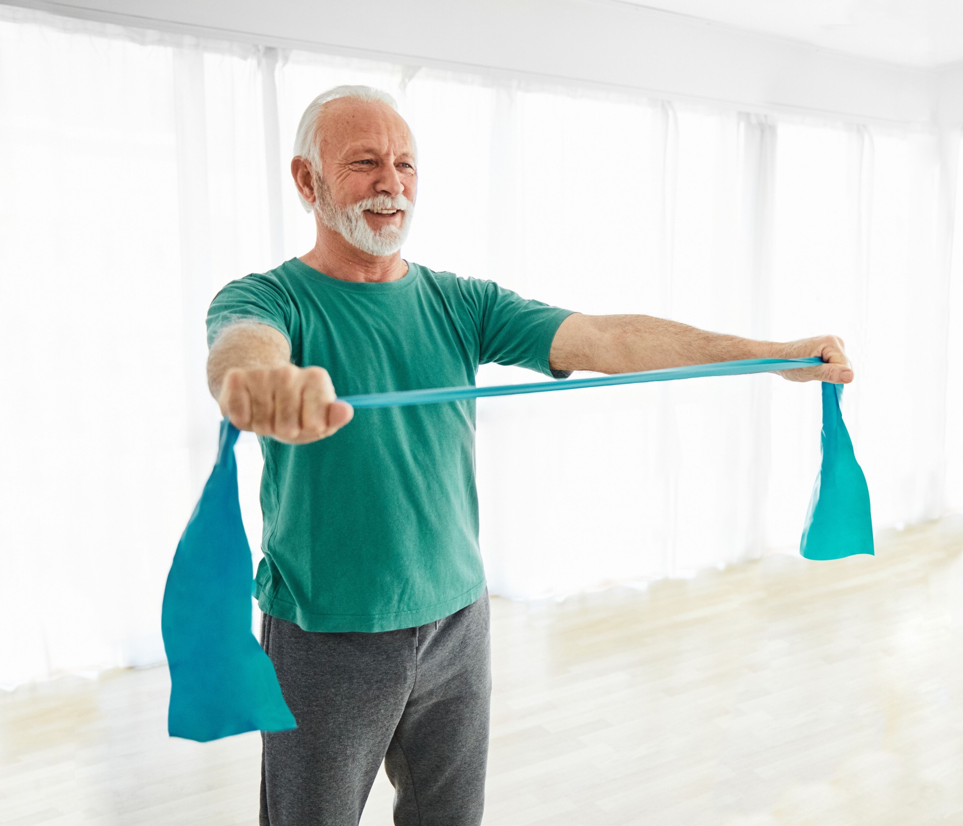 senior stretching exercise training rehabilitation physiotherapy treatment sport fitness home healthy gym exercising fit man strength band resistance clinic