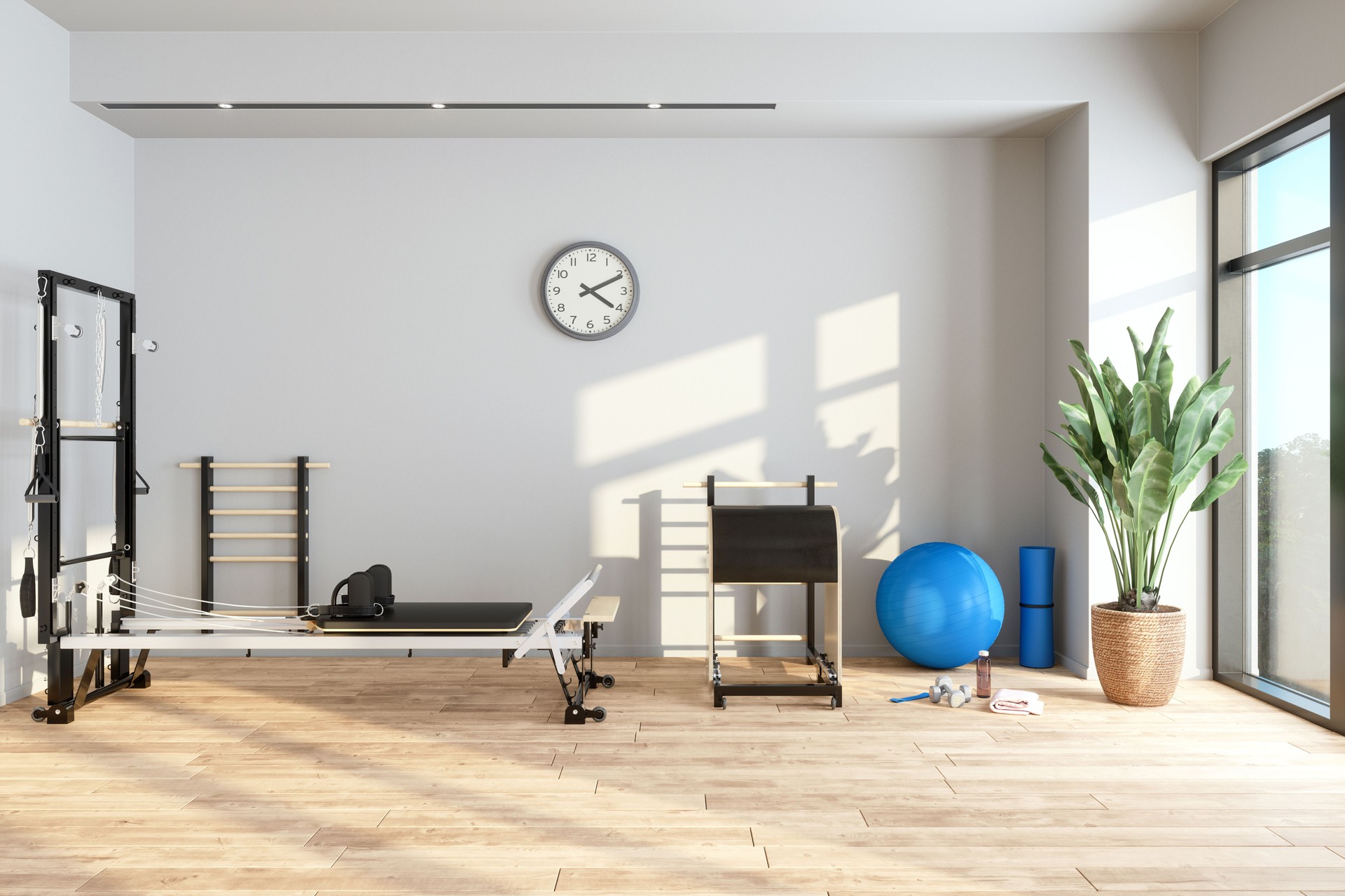 Pilates Reformer Machine With Tower And Other Pilates Equipments In Personal Training Studio.